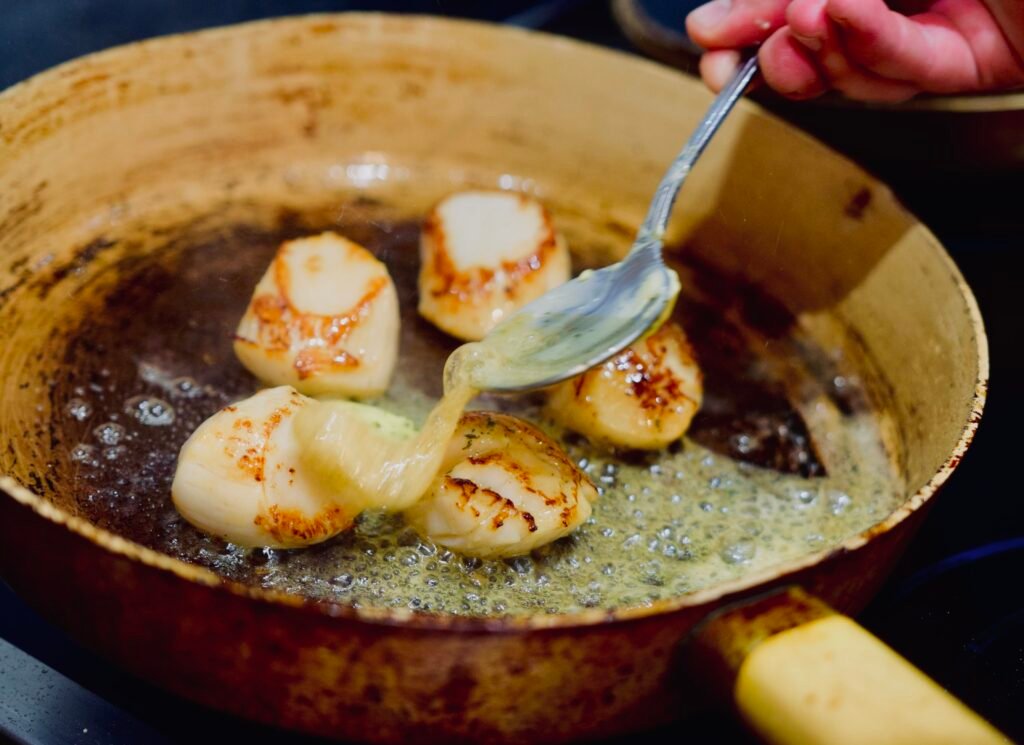 pan-seared scallops being based in garlic butter